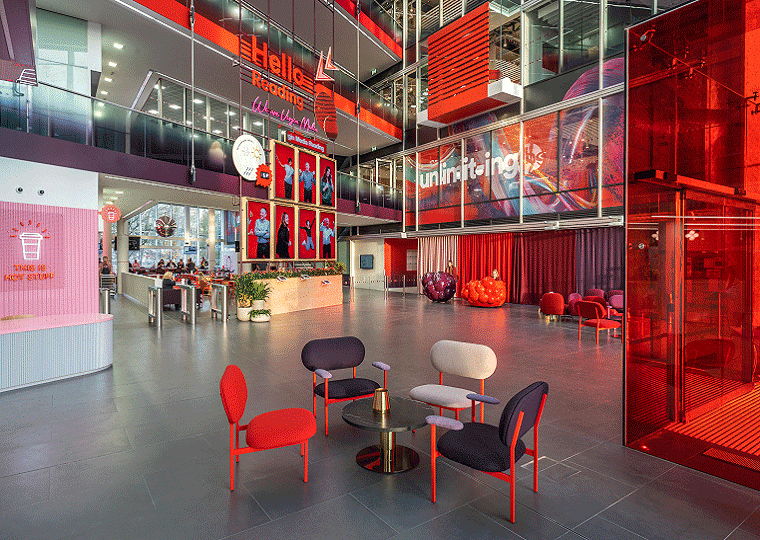 Photograph of the red and grey interior of Virgin Media’s Reading headquarters